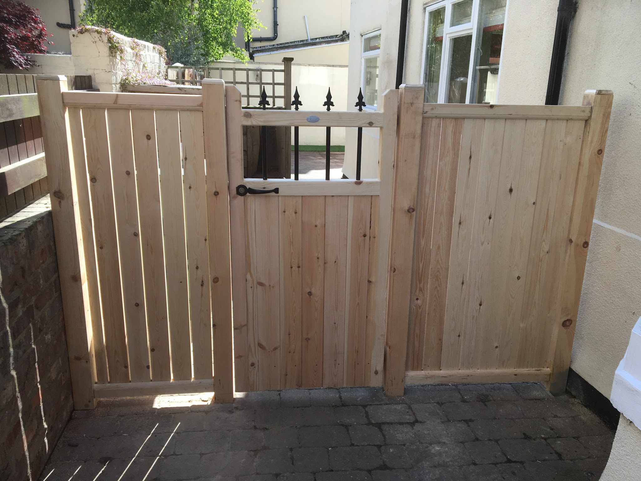 Hand built timber side gate with matching fence panels
